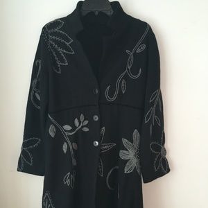 Black coat with grey embroidered detail